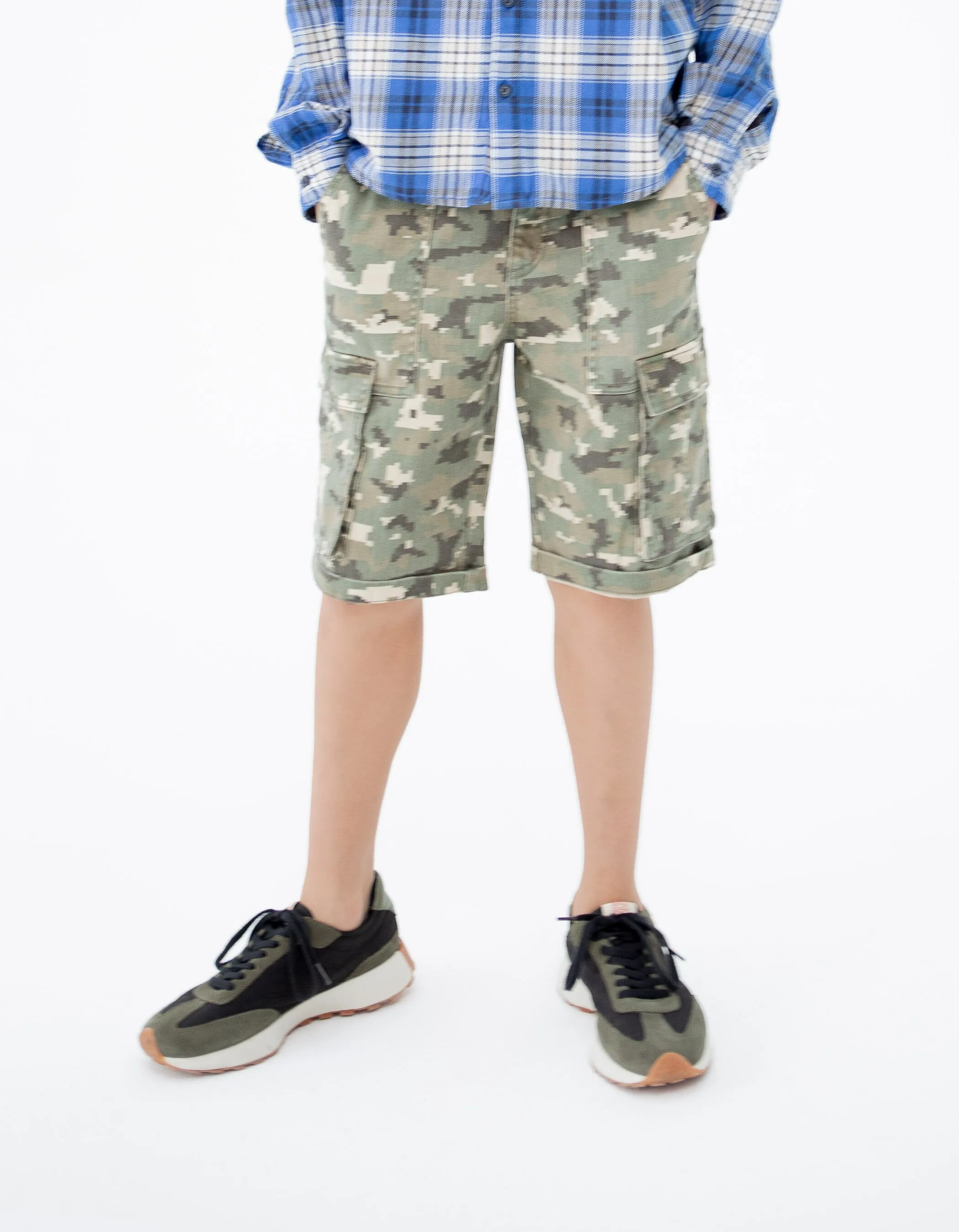 Bermuda camouflage shorts with pixelated design for boys.