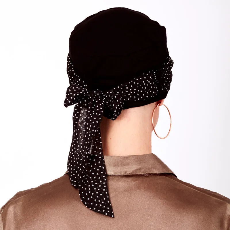 Cathy black and white bonnet with integrated headband - available on Oncovia.