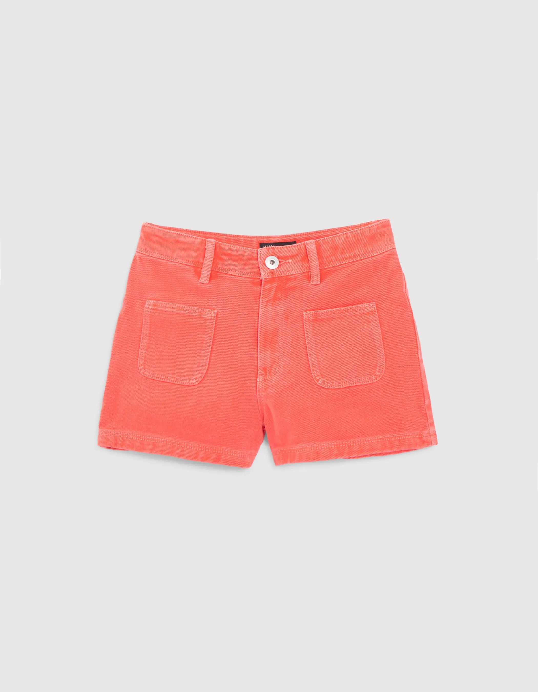 Red upcycled denim shorts with patch pockets for girls.